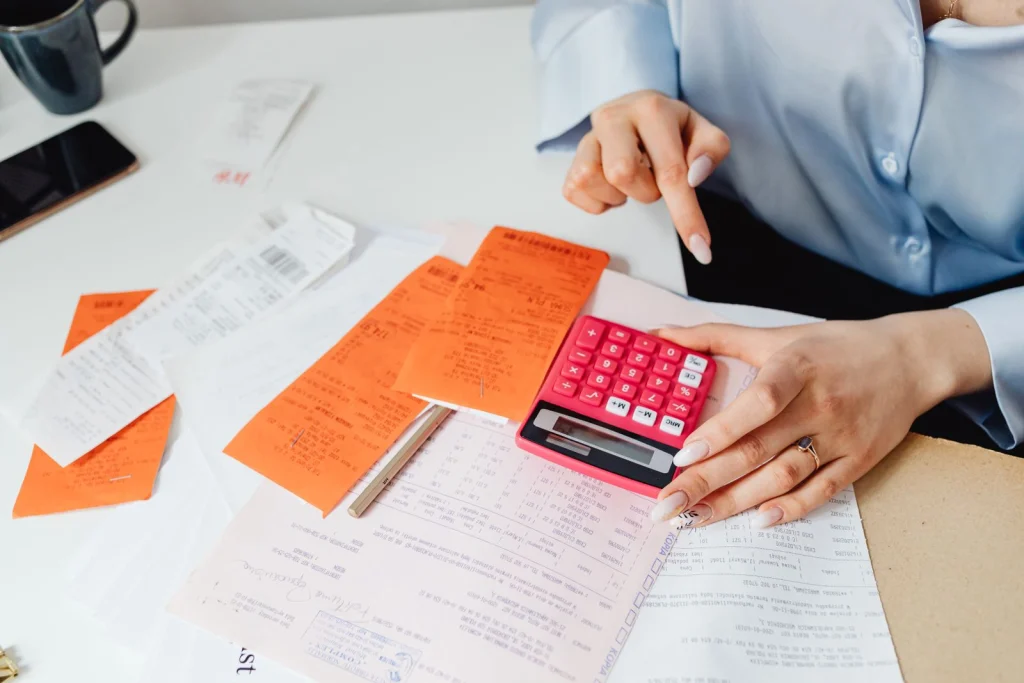 Calculator and receipts on a desk